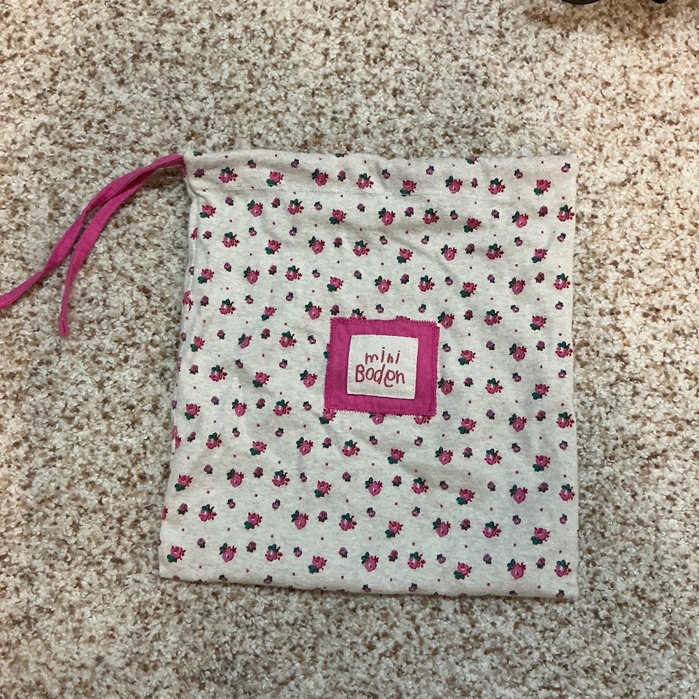 Mini Boden small flexible bag for anything. Adjustable pink strap